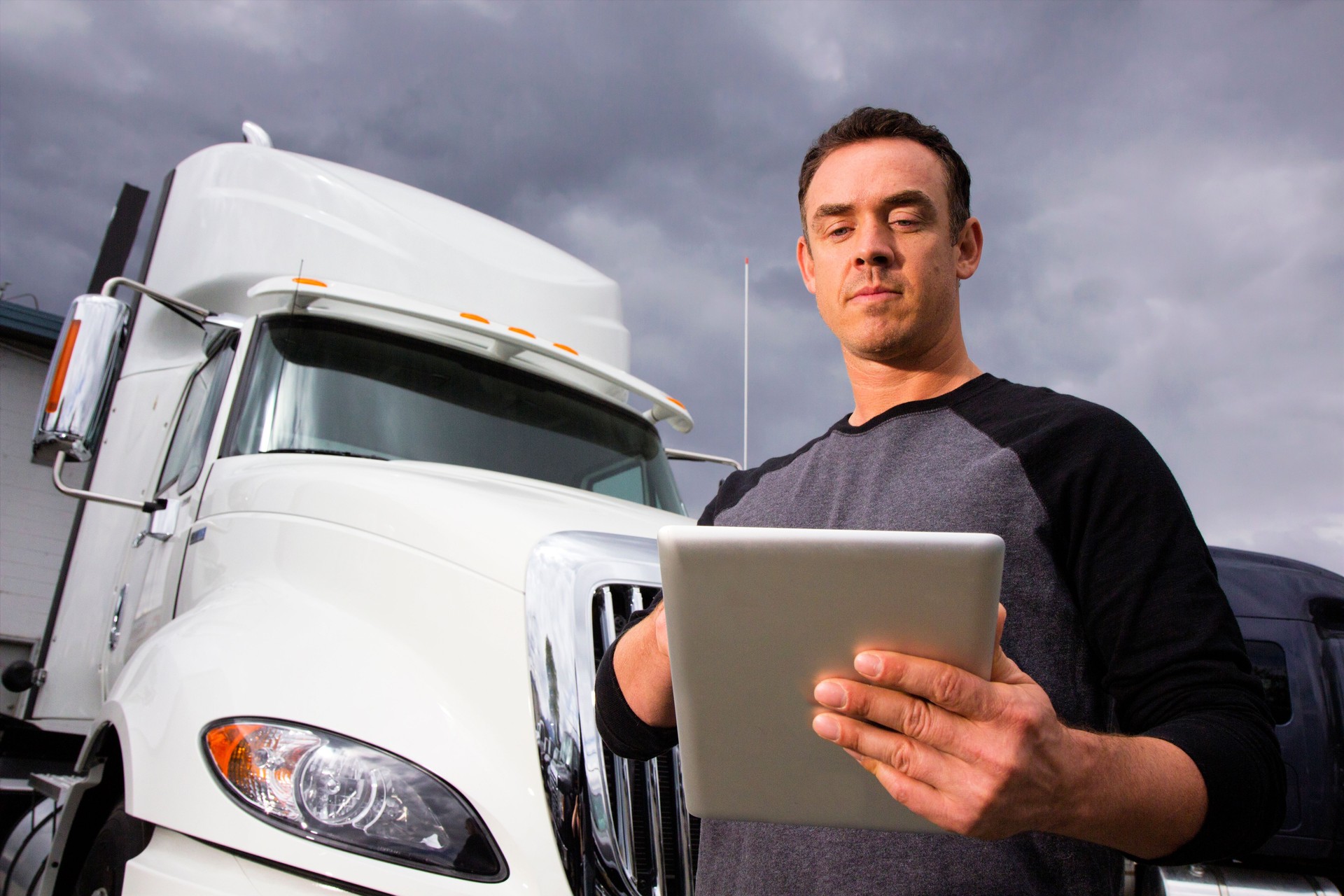 Trucker Using a Tablet